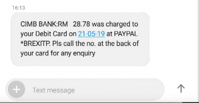 Text confirmation from her bank that the equivalent of £5.00 sterling plus charges had been removed in ringgit from her account