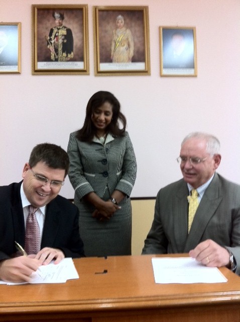 Hargreaves signing a deal as CEO of Contraves in 2011