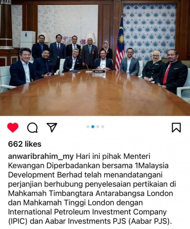 Zafrul (centre left) and Anwar (centre right) seal the skinny deal in London